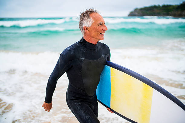 Senior Man and Surf Board