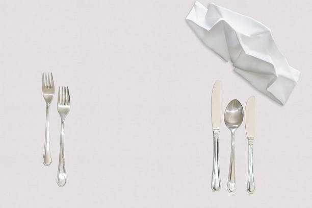 istock Cutlery and napkin on table 510787408