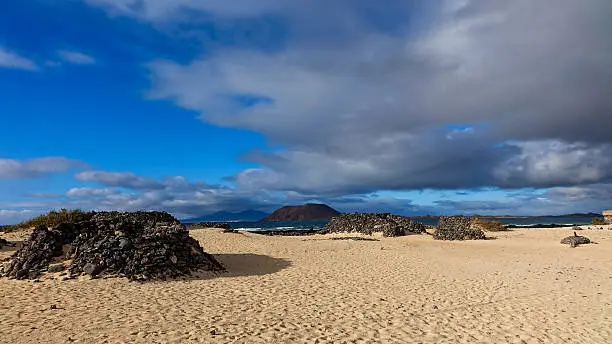 The beach with breaking waves on the Natural park,Corralejo,Canary-islands,Spain