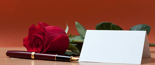 istock Rose and sheet of paper 510791226