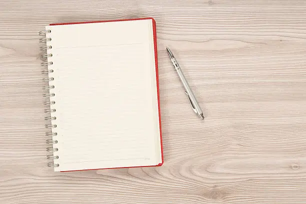 Photo of blank notebook on the table