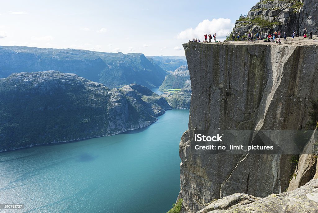 Pulpit Rock and Lysefjorden Many people on Preikestolen , Pulpit Rock 608m above Lysefjorden in Norway. Preikestolen - Norway Stock Photo