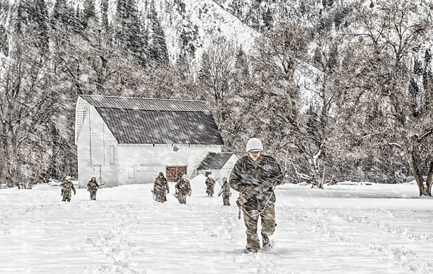 istock WWII Infantry Squadron On Partol In A Snow Storm 510792074