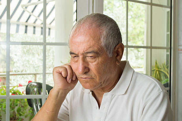 istock elderly man ost in thought 510792491