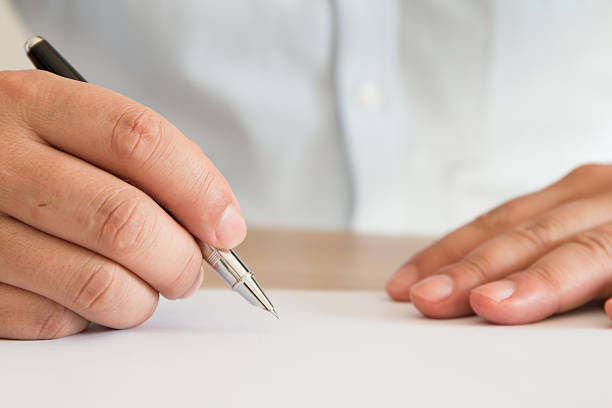 istock Businessman signing documents 510792570