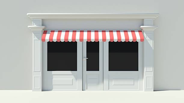 istock Sunny Shopfront with large windows White store facade 510793309