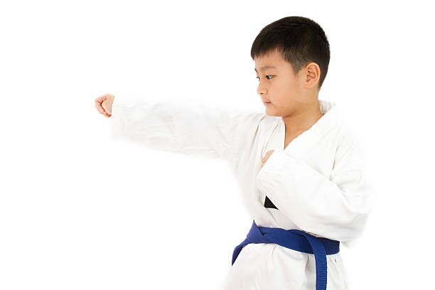 istock Asian Little Karate Boy in White Kimono 510798192
