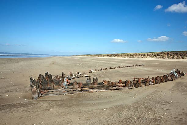 istock Boat wreck remains on Welsh beach 510798529