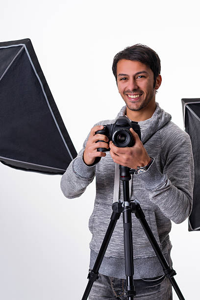 istock Photographer with camera and tripod 510798542