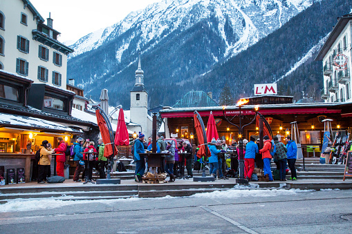 Chamonix, France - January  25, 2015:  Outdoor Bar during Happy hour and people relaxing after ski in Chamonix town in French Alps, France