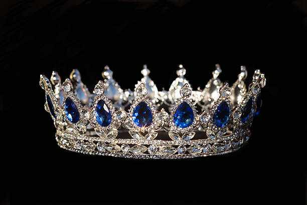 istock Royal crown with sapphire on black background 510799998