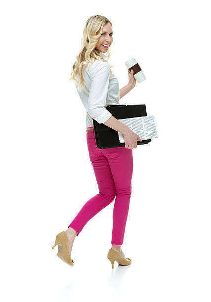 Cheerful businesswoman holding coffee cuphttp://www.twodozendesign.info/i/1.png