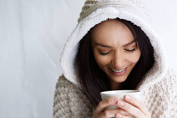 istock Beautiful young woman drinking coffee 510844938