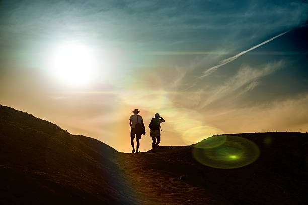 istock Traveler walking couple. Sunset. 510845144