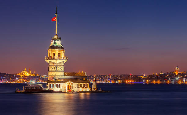 Maiden's Tower and old Istanbul Maiden's Tower at the night. maidens tower turkey photos stock pictures, royalty-free photos & images