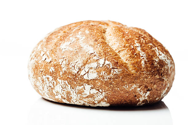 istock Closeup to wholegrain wheat bread roll, on white background 510846648