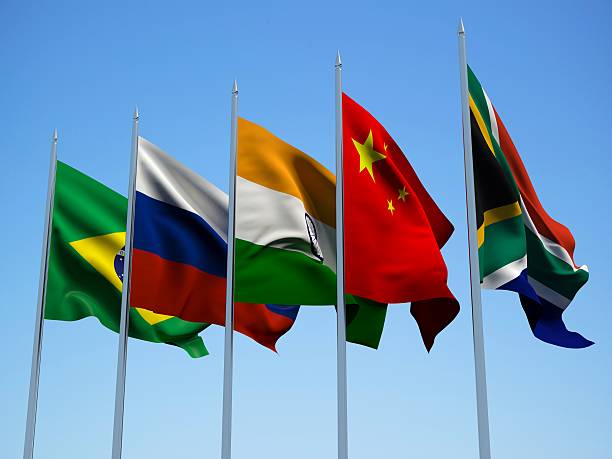 BRICS countries flags. 3d illustration BRICS countries flags waving in the wind with a blue sky background. 3d illustration brics stock pictures, royalty-free photos & images