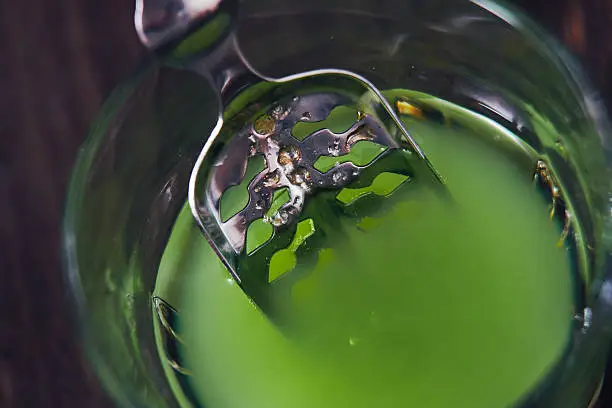 Photo of Absinthe In Glass With Spoon