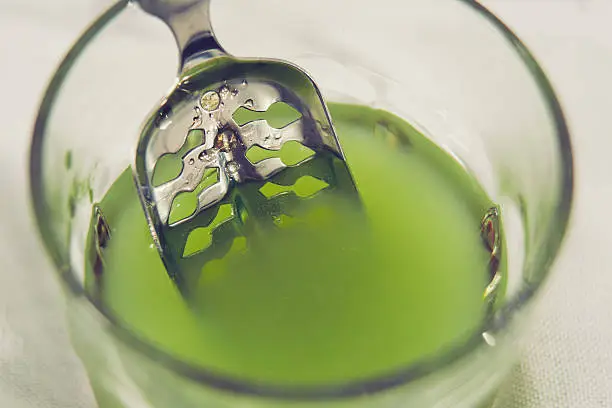 Photo of Absinthe In Glass With Spoon