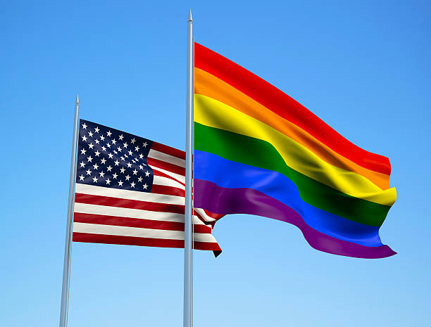 istock USA and Rainbow flags. 3d illustration 510852846