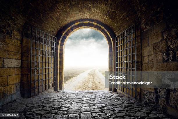 Gate Opening To Endless Road Leading Nowhere Stock Photo - Download Image Now - Prison, Door, Open
