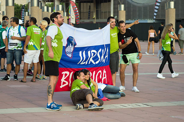 BARCELONA - SEPTEMBER 6: Slovenia fans before match Barcelona, Spain - September 6, 2014: Slovenia fans before match Round of 16 Basketball Worldcup, Slovenia vs Dominicana Republic Basketball Worldcup, in Palau Sant Jordi stadium mavericks california stock pictures, royalty-free photos & images