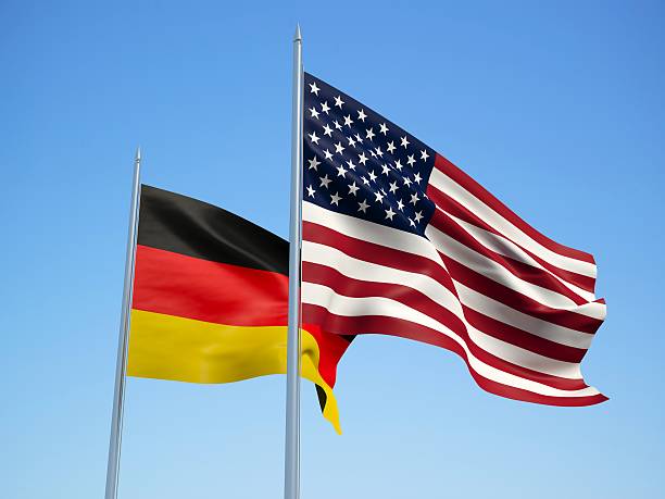 istock American and Germany Flags. 3d illustration 510853180