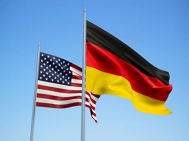 istock American and Germany Flags. 3d illustration 510853226