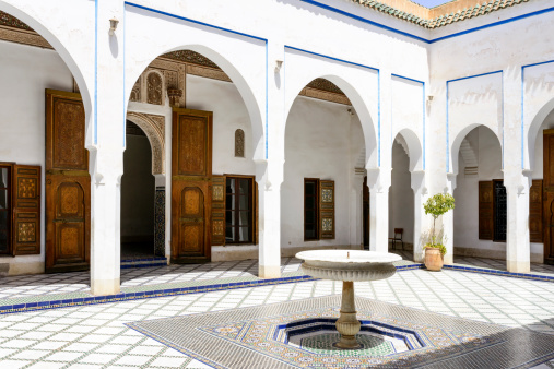Marrakesh, Morocco  - August 24, 2014: El Bahia Palace which is visited by thousands of tourists from around the world. It is an example of Eastern Architecture from the 19th century.
