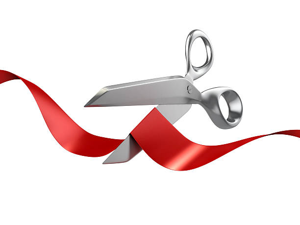 istock scissors cutting red ribbon 510853513