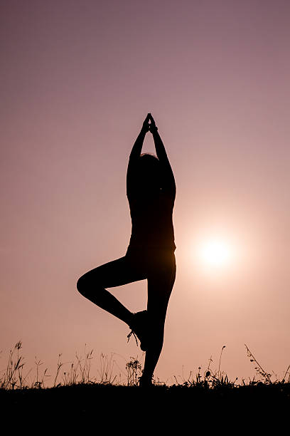 istock Silhouette woman with standing position yoga. 510857637