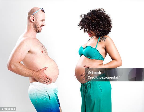 Funny Pregnant Couple Comparing Bellies Stock Photo - Download Image Now -  Pregnant, Men, Women - iStock