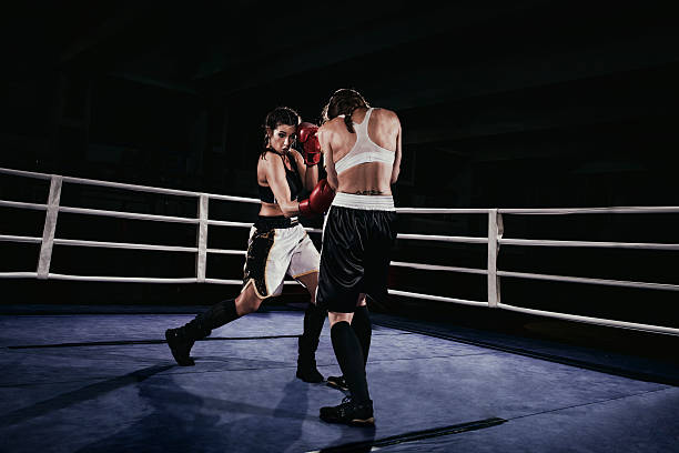 istock Female boxers fighting in a boxing ring 510859694