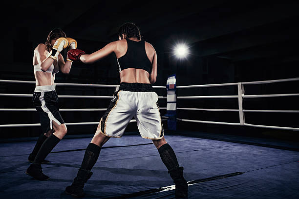 istock Female boxers fighting in a boxing ring 510859828