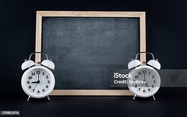 Nine To 5 Corporate Working Hours Concept Stock Photo - Download Image Now - 5 O'Clock, 9 O'Clock, Black Background