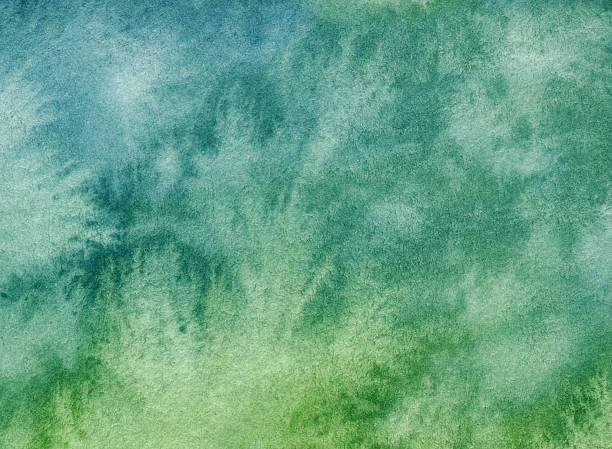 istock Gradient of green and blue hand painted textured background 510864470
