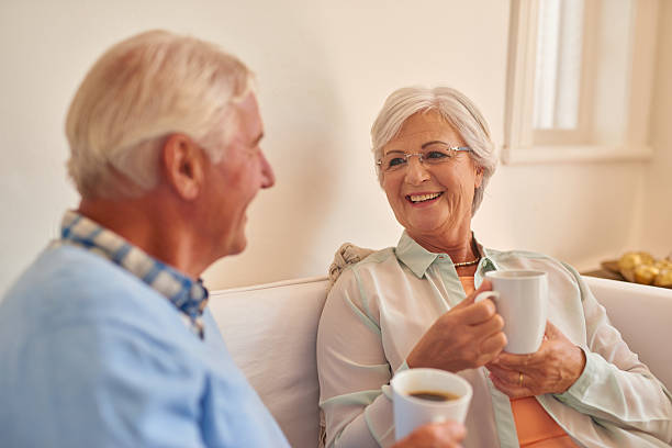 istock Senior couple at home together drinking morning tea 510865132