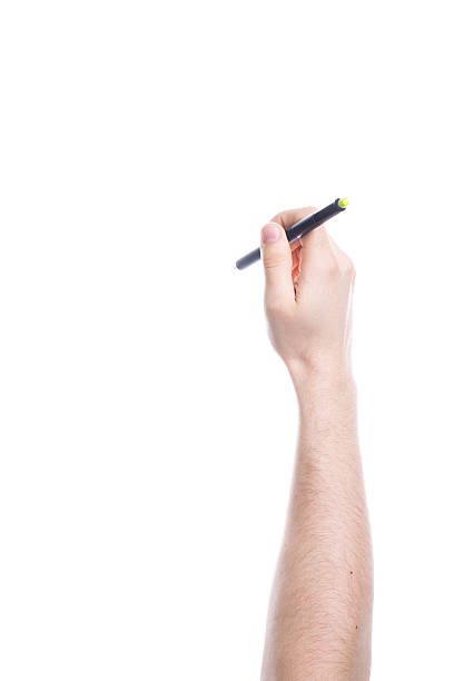 istock Hand holding a black pen isolated on white background 510866841