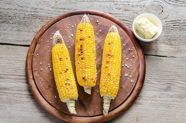 istock Grilled corn on the wooden board 510867445
