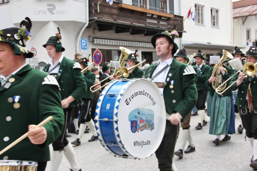Miesbach, Germany - May 4, 2014: In honor of the President of Germany, Joachim Gauck, attracted over 3000 Bavarian Mountain troops in a celebratory parade past him. Among them were drummers and other musicians. All participants were deployed in your various traditional costumes.