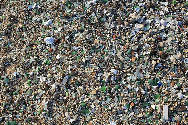istock pieces of sand stone and broken glass 510868153