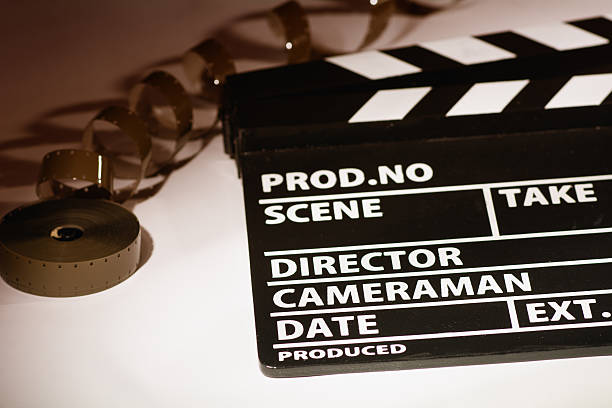 istock Movie clapper with 16 mm film. 510868784