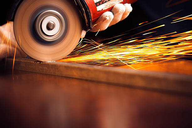 istock Red hot sparks at grinding steel material 510870015