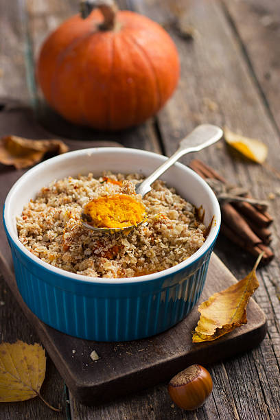istock sweet pumpkin and apple crumble  on blue ramekin 510870254