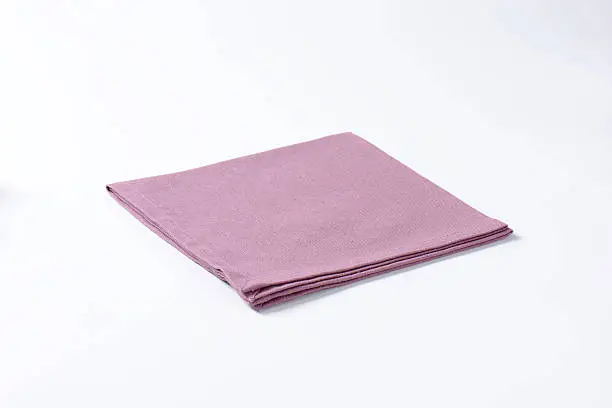 purple napkin on white background