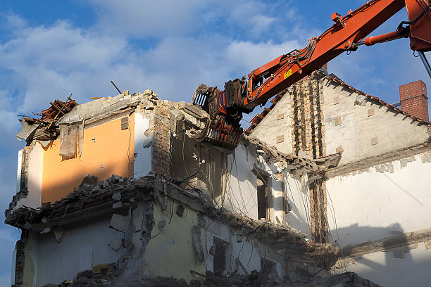 istock Demolition of a house with an excavator 510870745