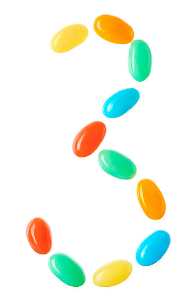 istock 3 number made of multicolored candies isolated on white 510870980
