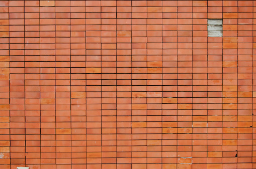 the orange brick block wall texture background