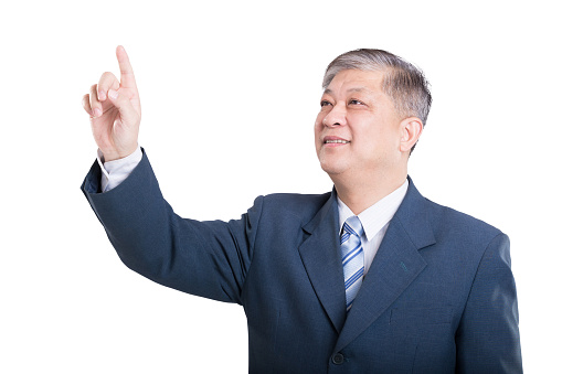 pose and gesture of old Asian businessman in black suit against white