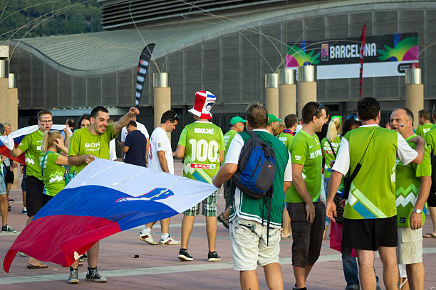 BARCELONA - SEPTEMBER 6: Slovenia fans before match Barcelona, Spain - September 6, 2014: Slovenia fans before match Round of 16 Basketball Worldcup, Slovenia vs Dominicana Republic Basketball Worldcup, in Palau Sant Jordi stadium mavericks california stock pictures, royalty-free photos & images